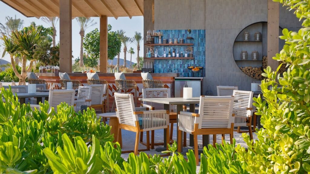 Beach Club restaurant and beachfront seating at St. Regis Red Sea Resort