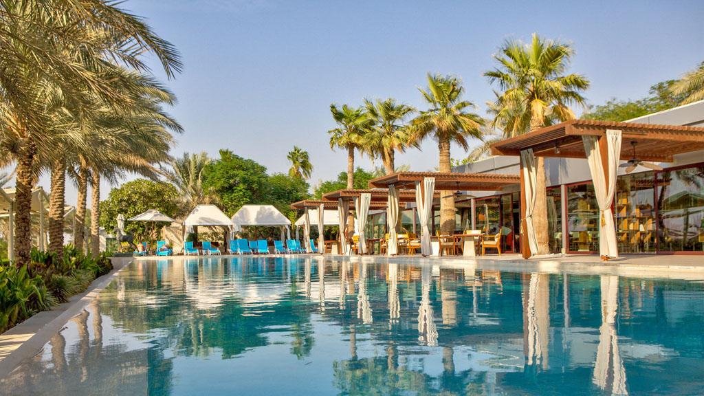 Melia Desert Palm Dubai equestrian luxury hotel with pool and gardens