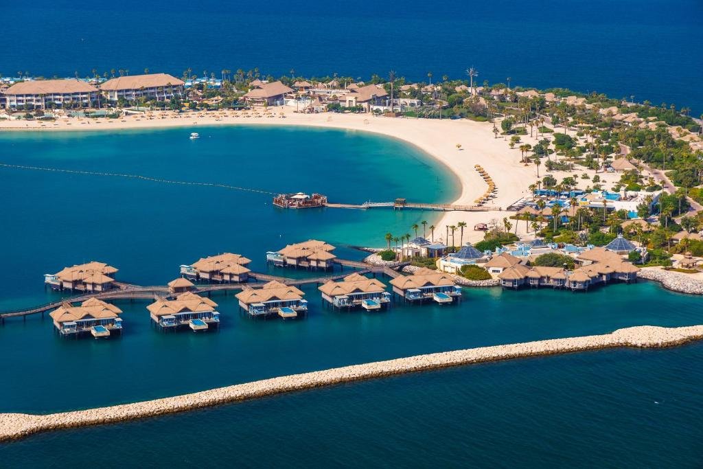 Banana Island Resort by Anantara with turquoise water and overwater villas in Qatar