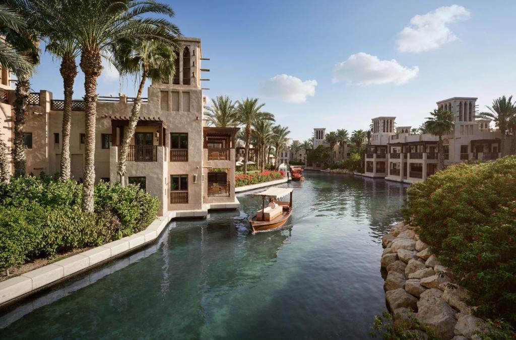 Luxurious resort with waterway and palms