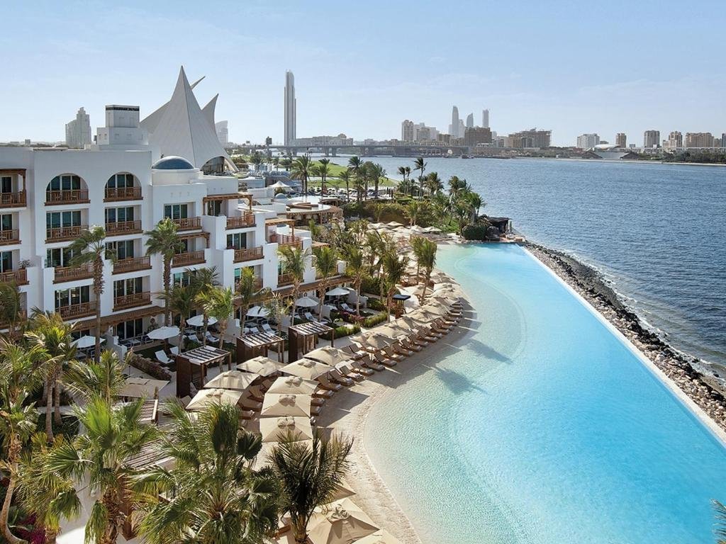 Luxurious beachfront resort with palm trees