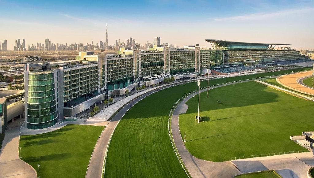 Modern racetrack with city skyline backdrop