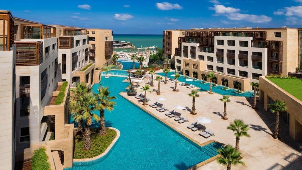 Kempinski Summerland Hotel and Resort Beirut pool and beach club setting