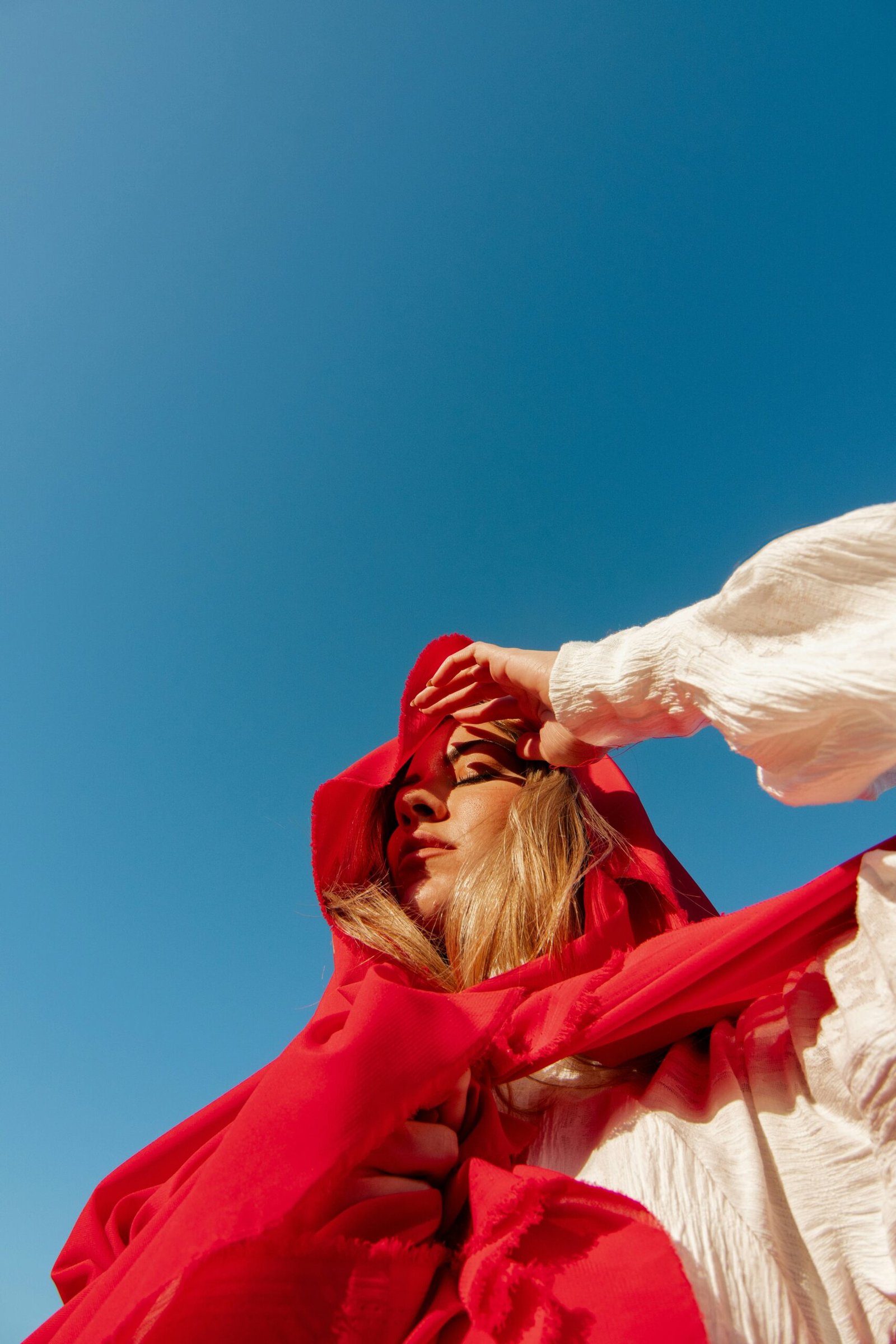 Woman in red headscarf