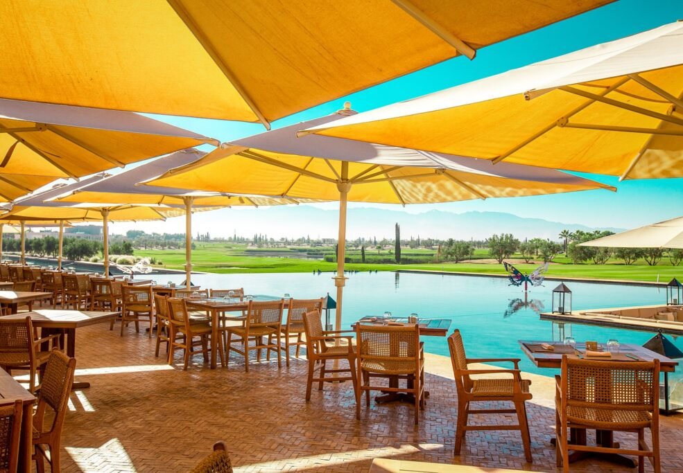 Outdoor Sunday brunch at Al Maaden Golf Marrakech with golf course and Atlas Mountain views
