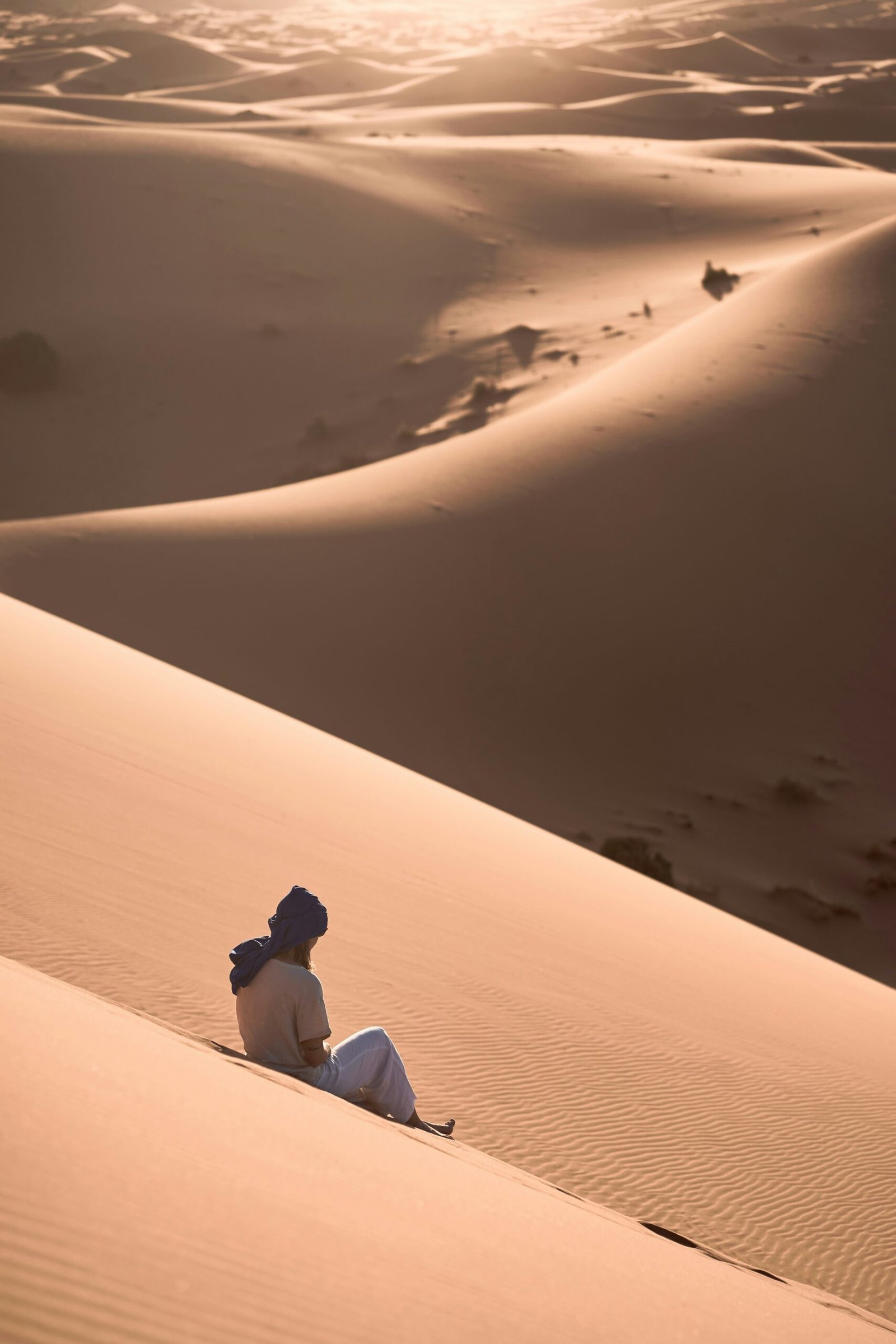 Woman wearing loose clothes in Moroccan desert