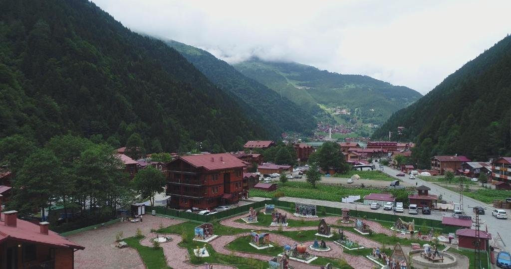Nova Uzungol apartment-style room with wooden details and mountain-style decor