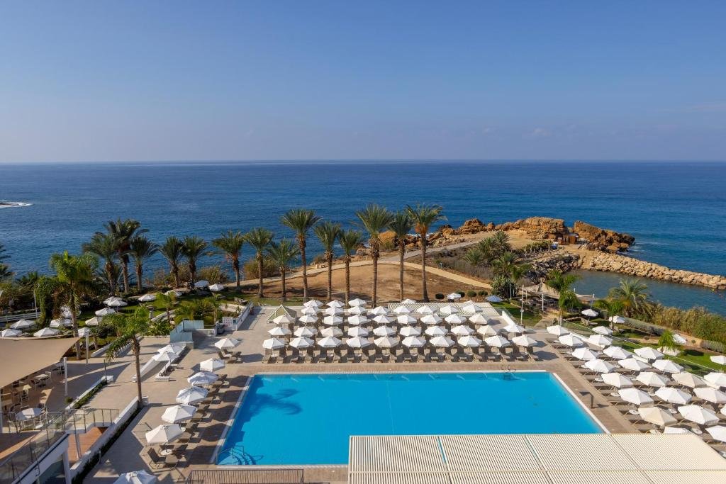 Sea-view resort setting at Queens Bay Hotel in Paphos