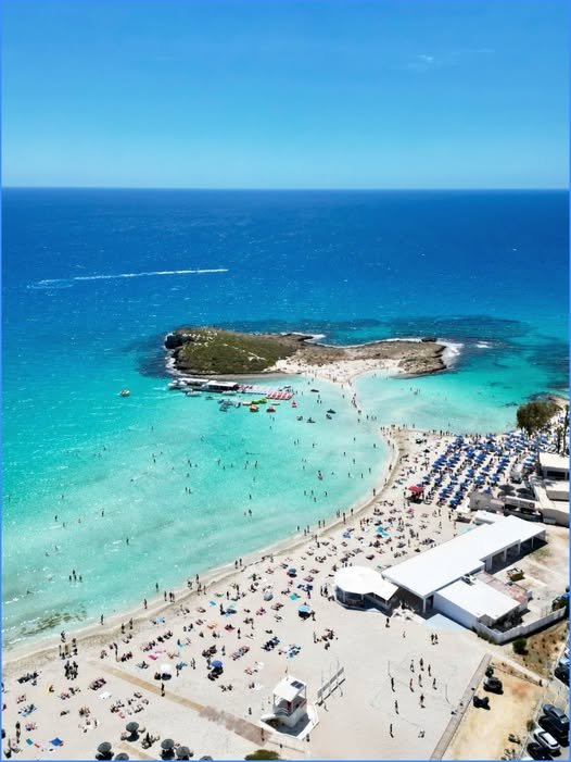 Nissi Beach in Ayia Napa with white sand and shallow turquoise water