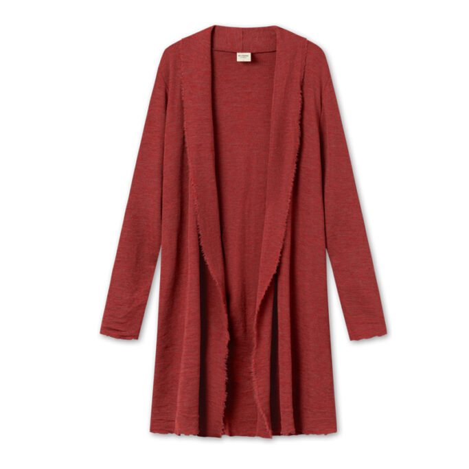 Long terracotta cardigan layered over a simple outfit