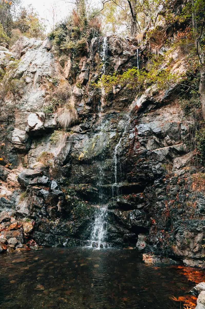 Caledonian Waterfalls trail in the Troodos Mountains with forest path and flowing water