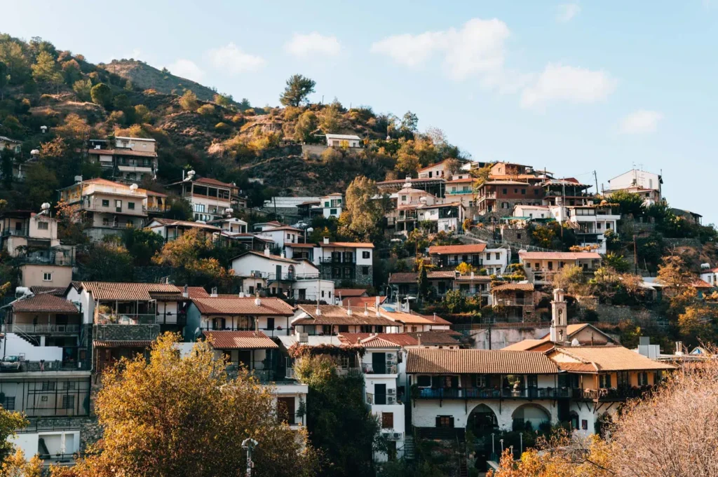 Kalopanayiotis village in the Troodos Mountains with hillside houses and green valley views