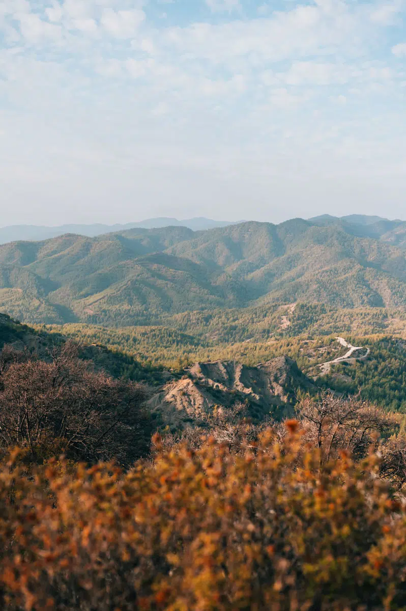 Troodos Mountains in Cyprus with green hills, mountain villages and scenic roads