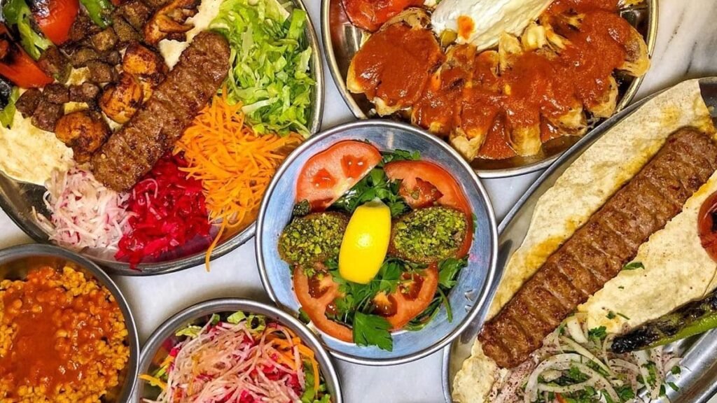Turkish kebab plate with grilled meat, vegetables, and flatbread in İzmir