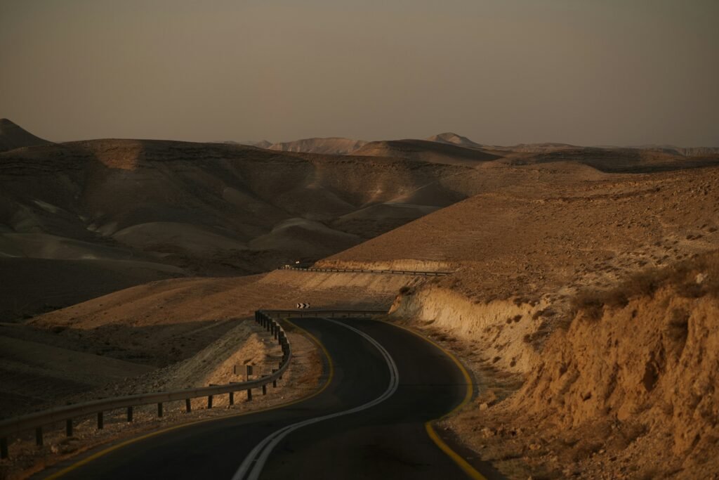 Mountain road in Jordan with sweeping views over rocky valleys