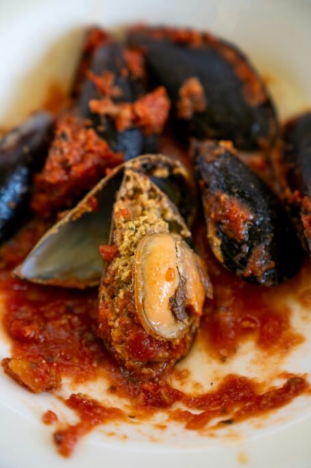 Stuffed mussels with lemon served as Turkish street food