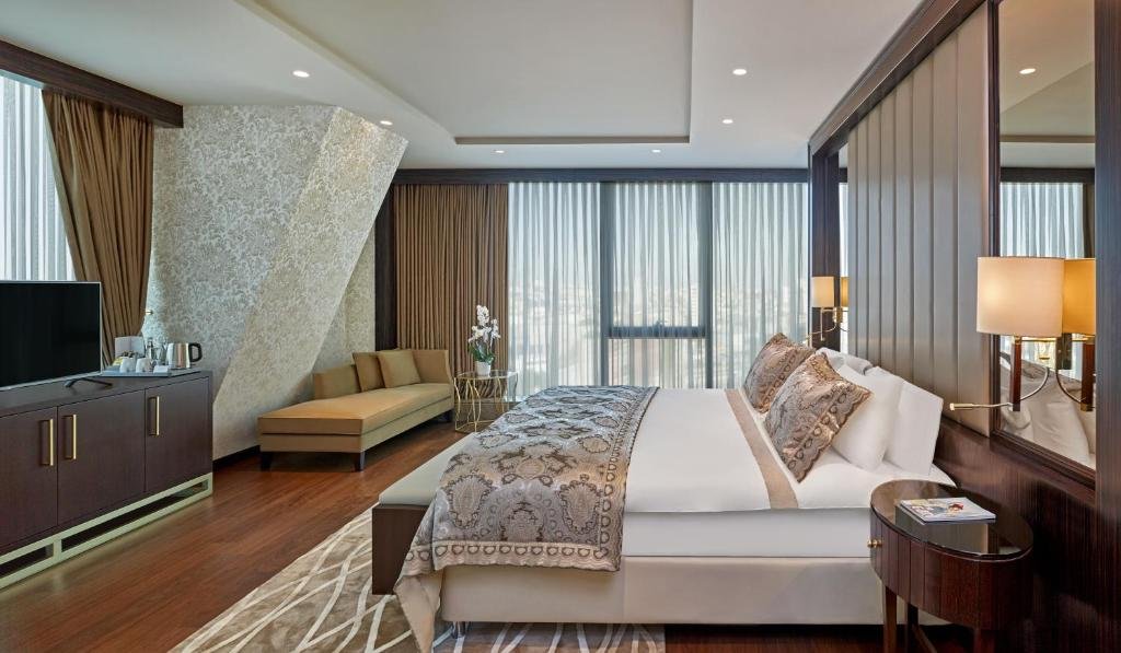 Elite World Grand Istanbul Basın Ekspres spacious bathroom with luxury hotel amenities