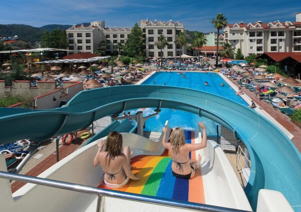 Swimming pool and resort buildings at Julian Club Hotel in Marmaris