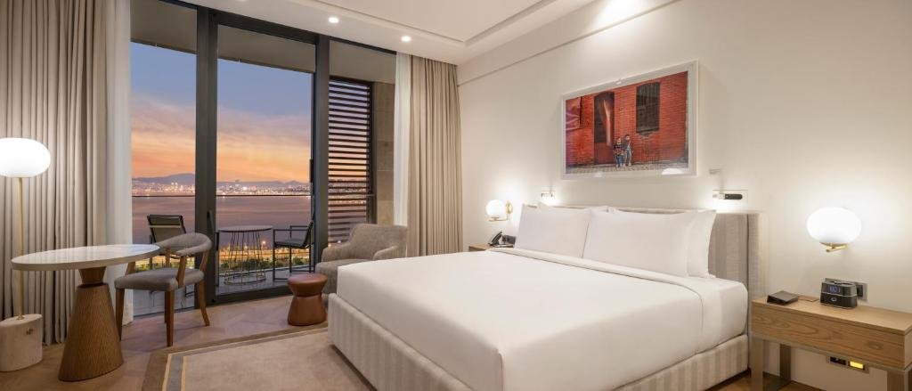 Modern guest room at Grand Hyatt Izmir IstinyePark with sleek luxury interiors