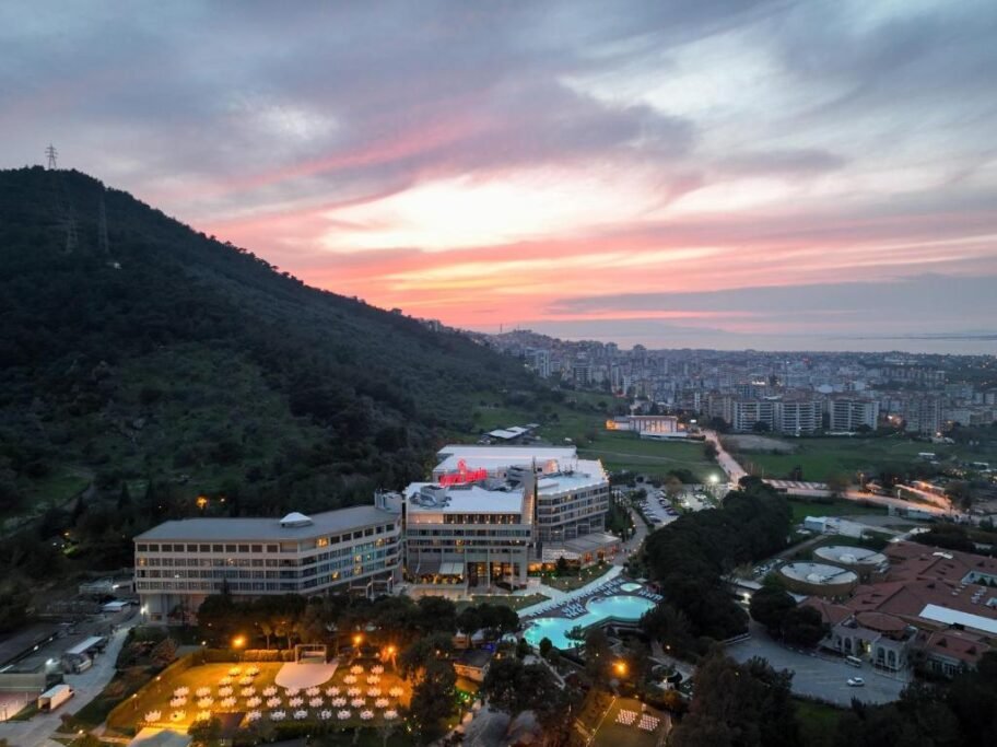 Kaya Izmir Thermal and Convention hotel exterior with landscaped pool area