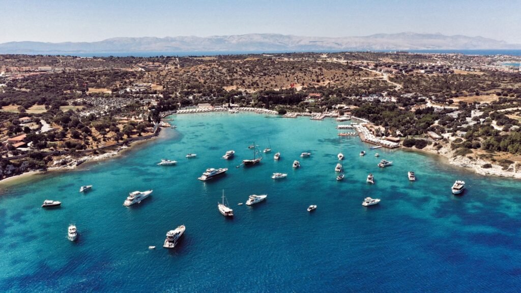 Aya Yorgi Bay in Çeşme with beach clubs and calm blue water