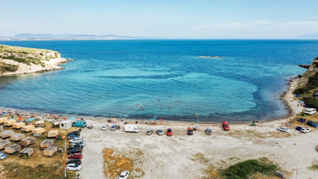 Demircili Bay in Urla with peaceful beach and clear Aegean water