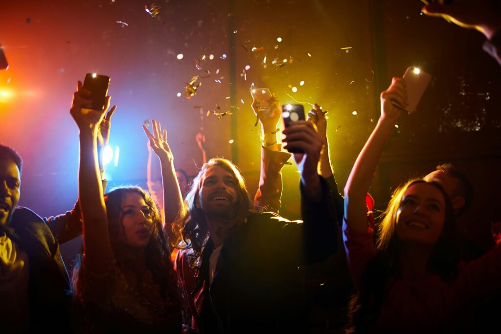 Dubai party scene with music, dancing, and evening drinks