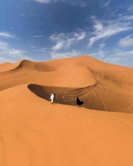 Quiet Dubai desert landscape with soft golden dunes