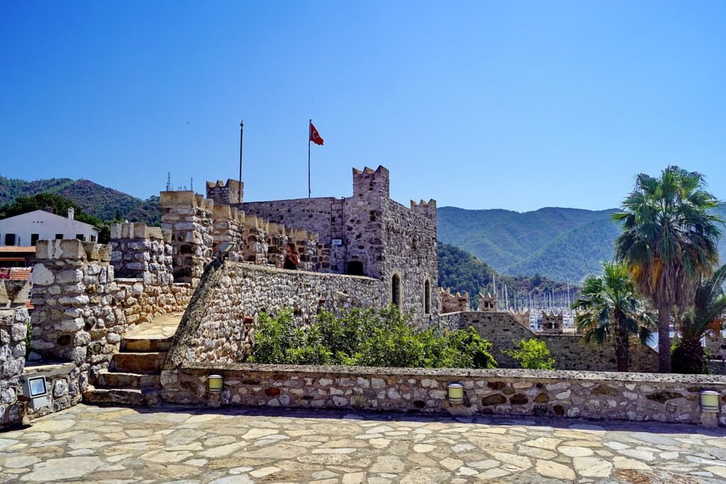 Stone walls of Marmaris Castle overlooking the harbor and coastline