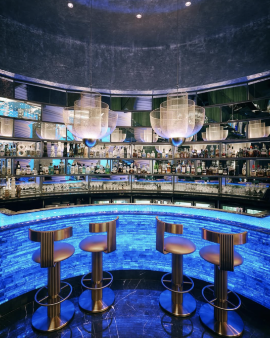 Romantic underwater dining room at Ossiano Dubai with aquarium views