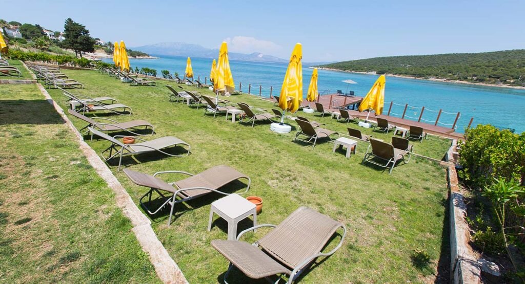 Paşalimanı Bay in Çeşme with pebble beach and calm blue water