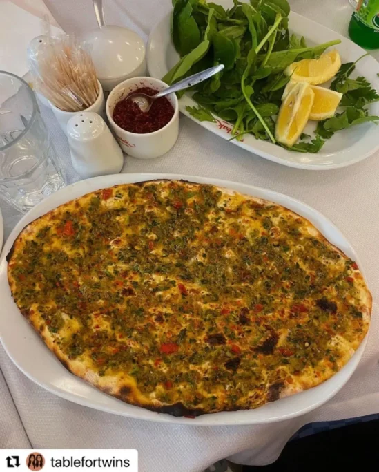 Tatbak Nişantaşı lahmacun with thin crispy dough and traditional toppings