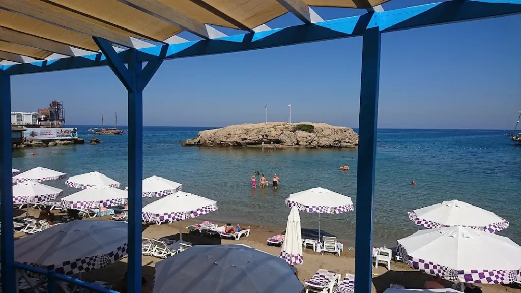 Escape Beach near Kyrenia with clear water, sunbeds, and an organised beachfront