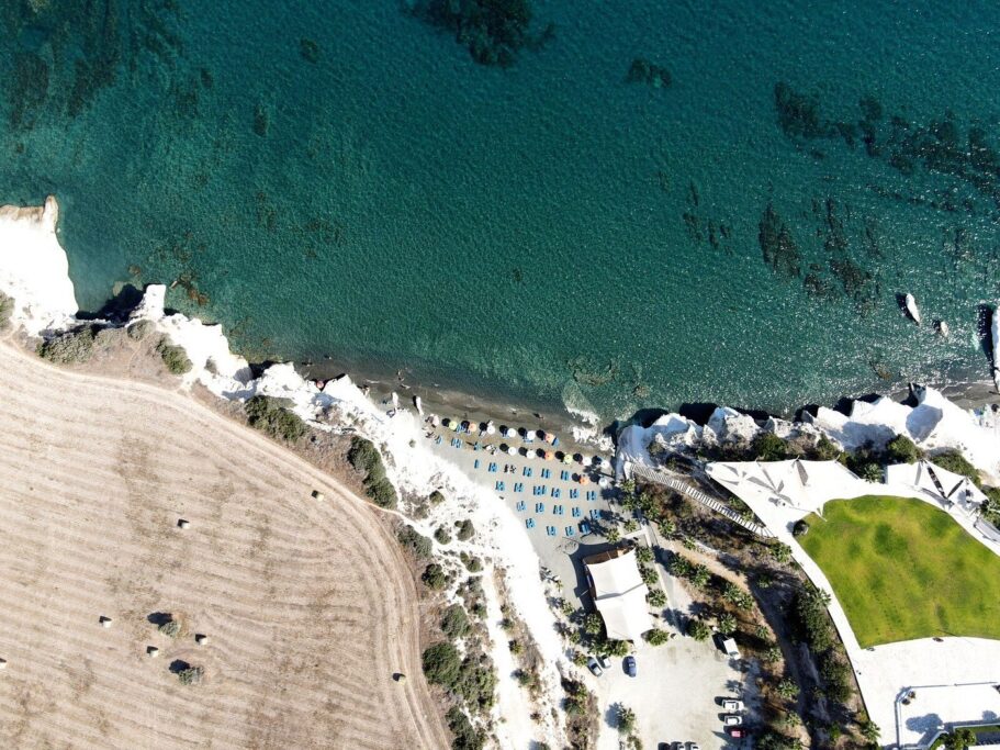 Governor's Beach near Limassol with white cliffs, dark sand, and clear sea