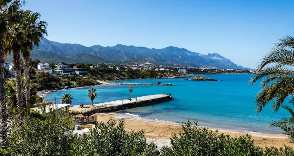 Kervansaray Beach near Kyrenia with calm water and a scenic coastal setting